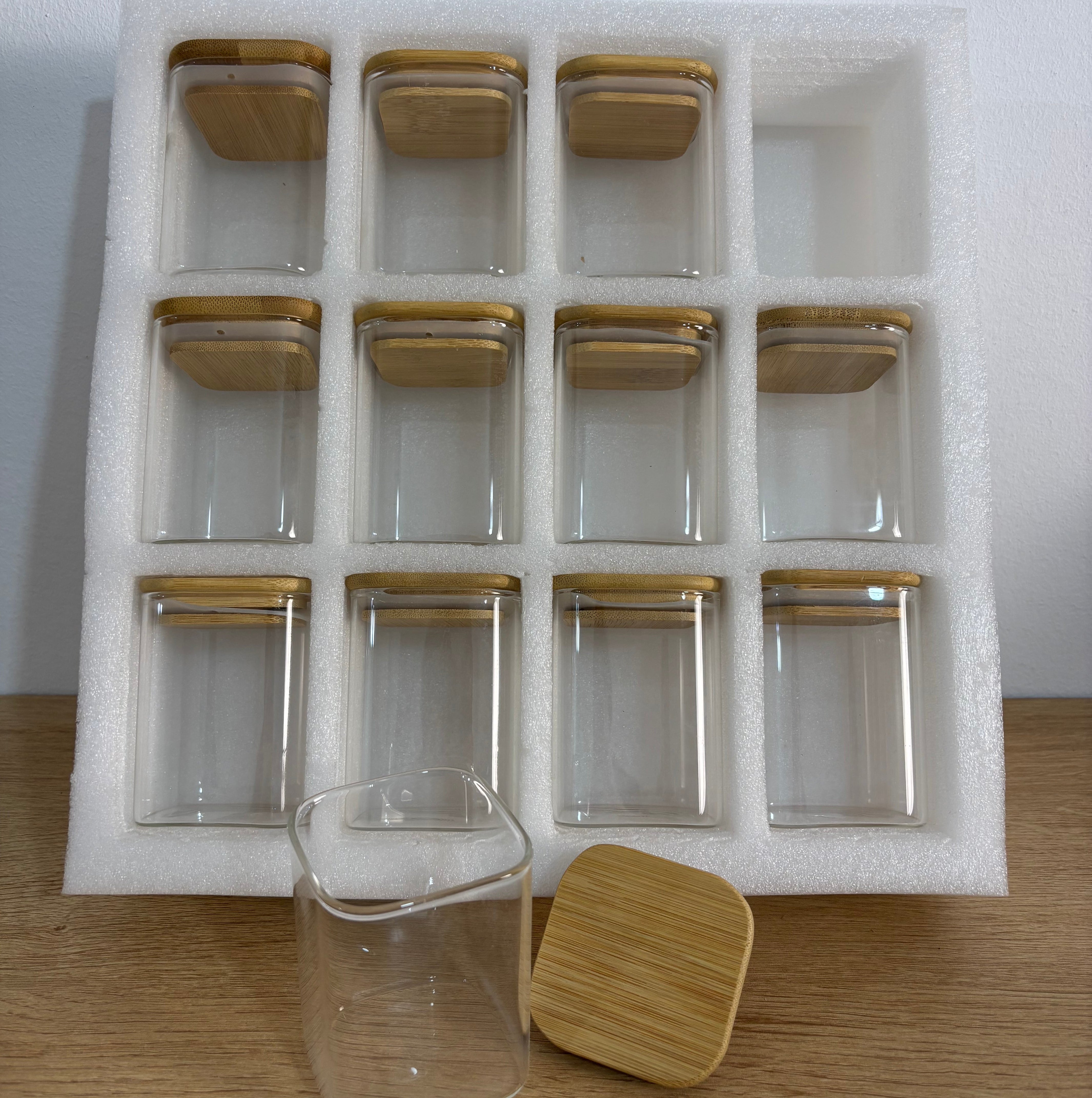 Set of 12 glass storage jars with lids for storing spices