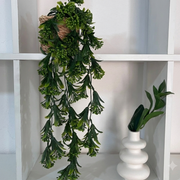 Waterfall planting with wicker basket